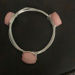 Silver bracelet with pink stones